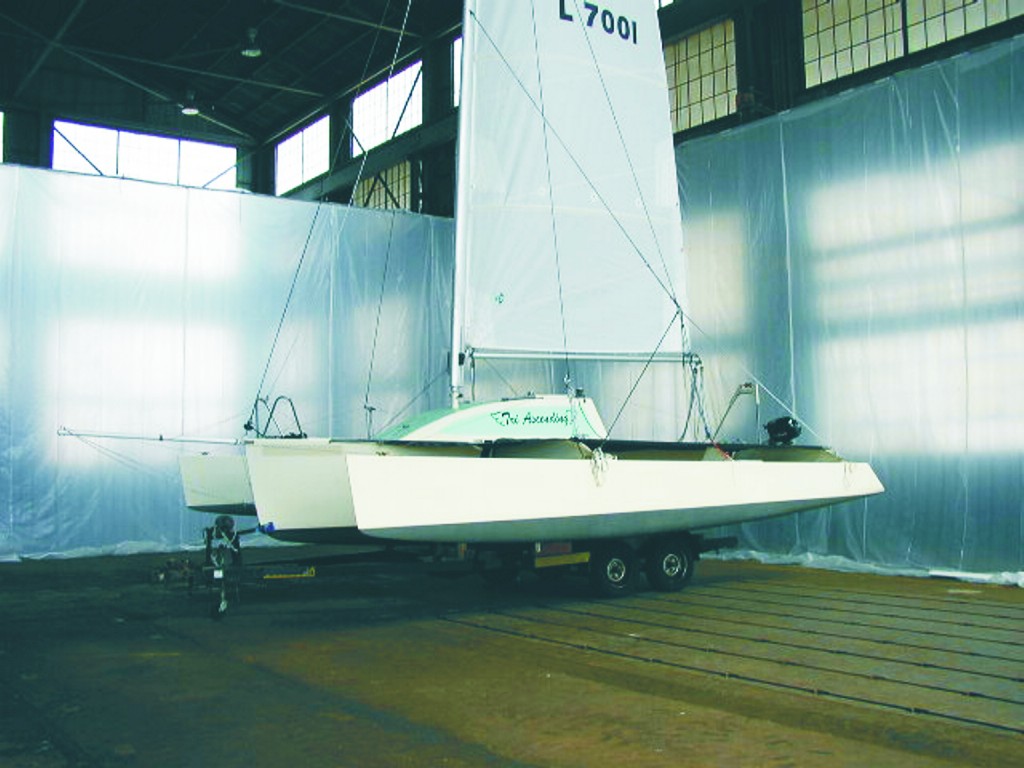 Figure 5—A completed L-7 folding trimaran. When folded, the L-7 is 8'4" wide and easily trailered.