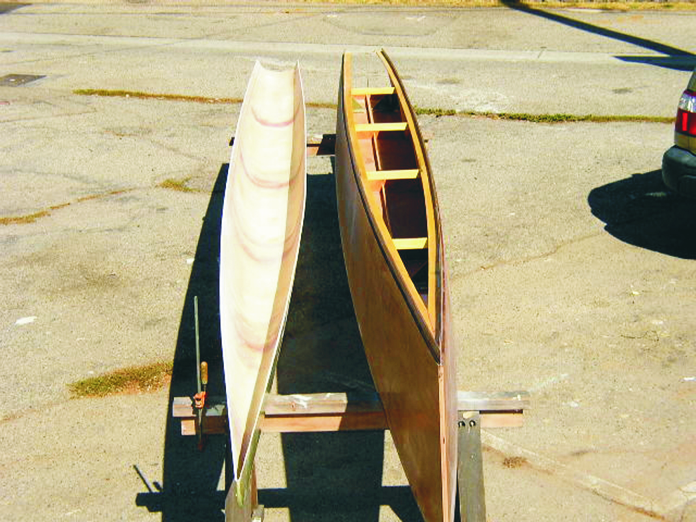 Figure 2—The pan and topsides of the L7 folding trimaran. The plywood topsides have been glued to the bulkheads. The next step is to install the butt blocks, to which the pan will be attached.