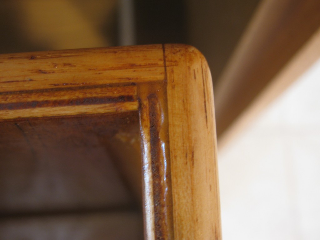 Detail of the custom wastebasket's finished lip.