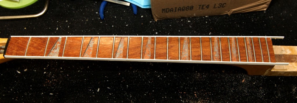 Strings removed from Rickenbacker in preparation for repairs.