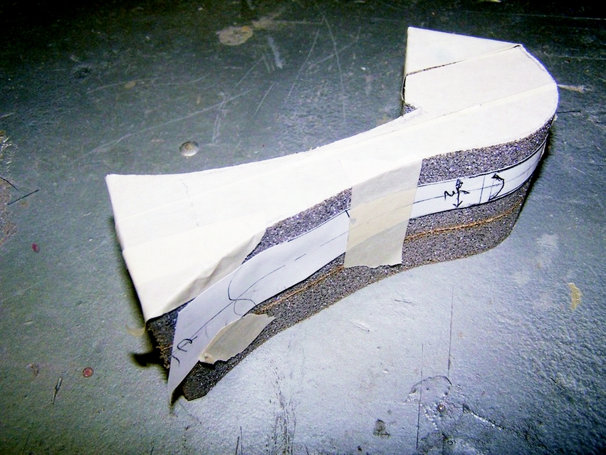 2: Make templates of the two side views and tape them to the foam billet. Use a band saw to cut out the rough shape of the mold.