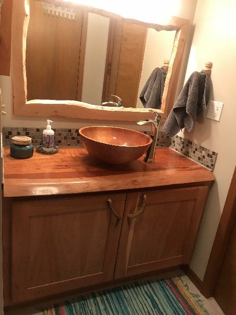 Black cherry basin with epoxy and polyurethane.
