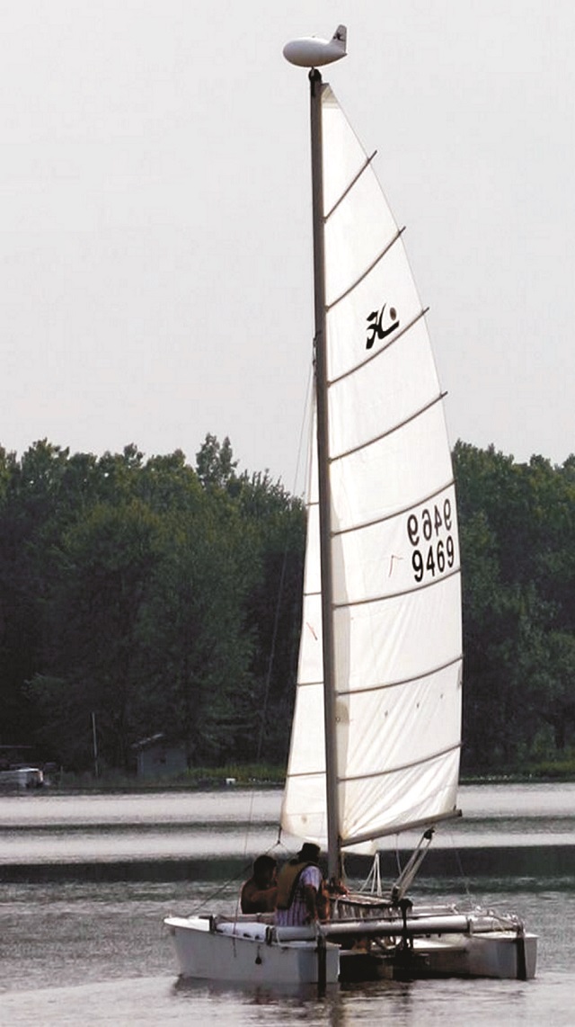 White sail boat