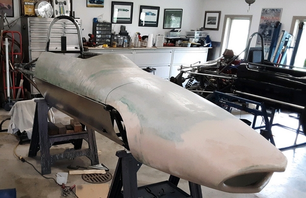 The new body being test fit on the car chassis. It has been faired, sealed with epoxy and is ready to be prepped for painting.