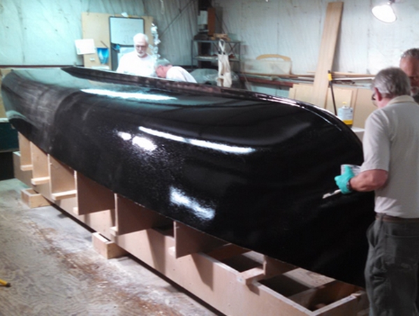 Often pigment will be added to aid in fairing. In this case, 502 Black Pigment was used to contrast with the tan 410 Microlight Fairing Filler.