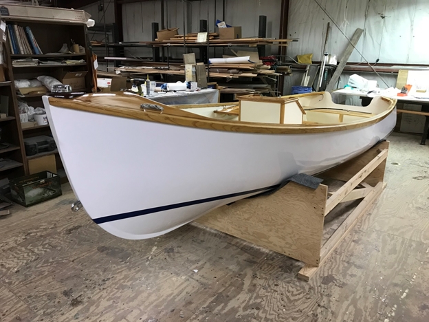 What a sweet sheer! The waterline was applied from the Jericho skiff plans. Often builders float the completed boat and mark the waterline location to paint later.