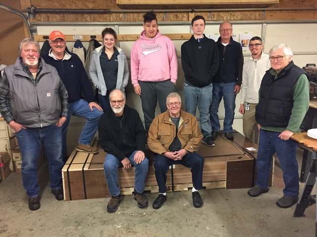 Boat building participants.