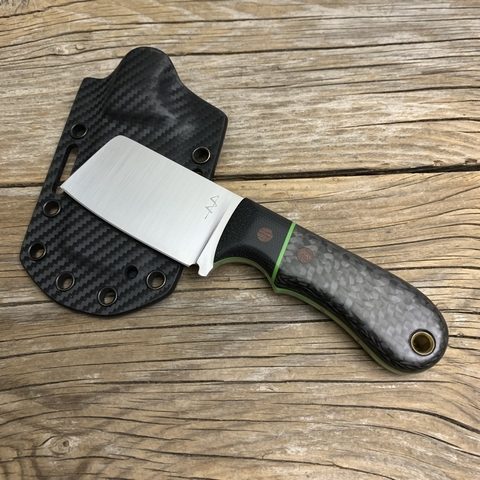 Belt cleaver with a carbon fiber handle and green accents.