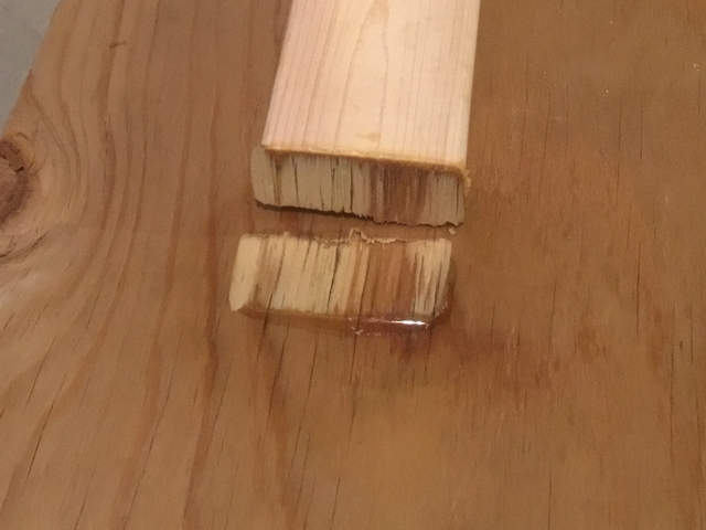 An example of a successful bond when choosing the right wood. The bonding of the epoxy to the plywood was stronger than the bond of the wood fibers to one another. You can see the wood fibers still attached to the end of the 2x4.