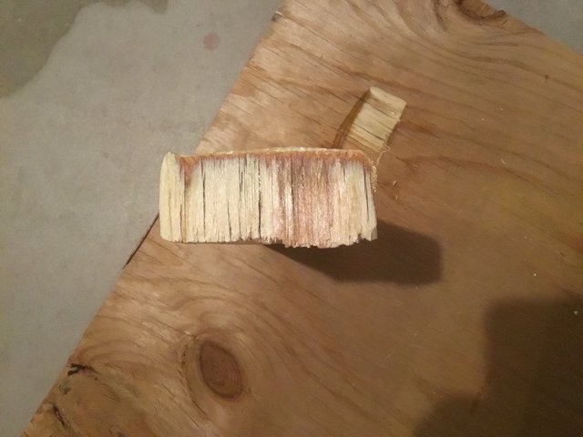 You can see the wood fibers still attached to the end of the 2x4.