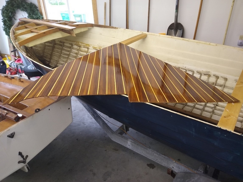 The new teak and holly foredeck with three coats of WEST SYSTEM 105 Resin/207 Special Clear Hardener® and seven coats of Captain’s Varnish 1015.