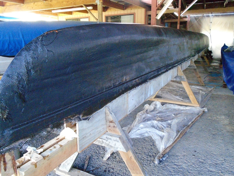 The canoe was covered with a layer of carbon fiber to help give it rigidity, followed by a layer of fiberglass for protection.