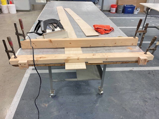 Before scarfing, the fence clamped to the plywood with additional secondary clamped 2"x4".