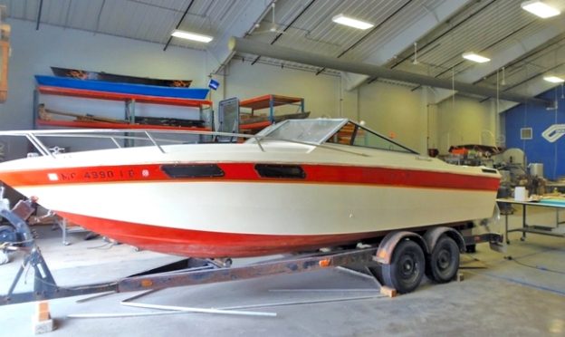 The completed Chris Craft transom painted with marine bilge paint.