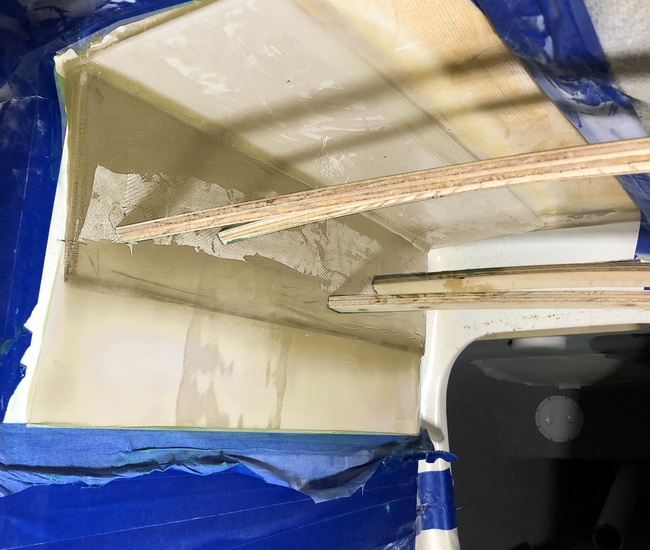 14. The G-10 panel bonded to the underside of the deck.