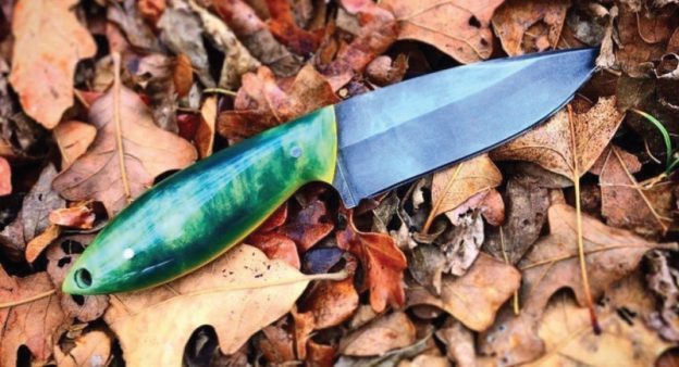 Custom knife with glow in the dark scales