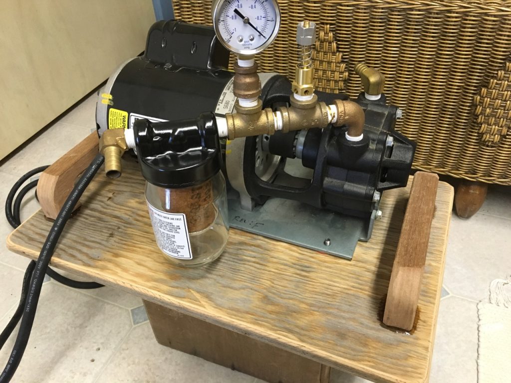 I fashioned a vacuum pump apparatus utilizing a medical ventilator pump that had exceeded its certified lifespan (Gast model 0870). - Epoxyworks # 60, Spring 2025.