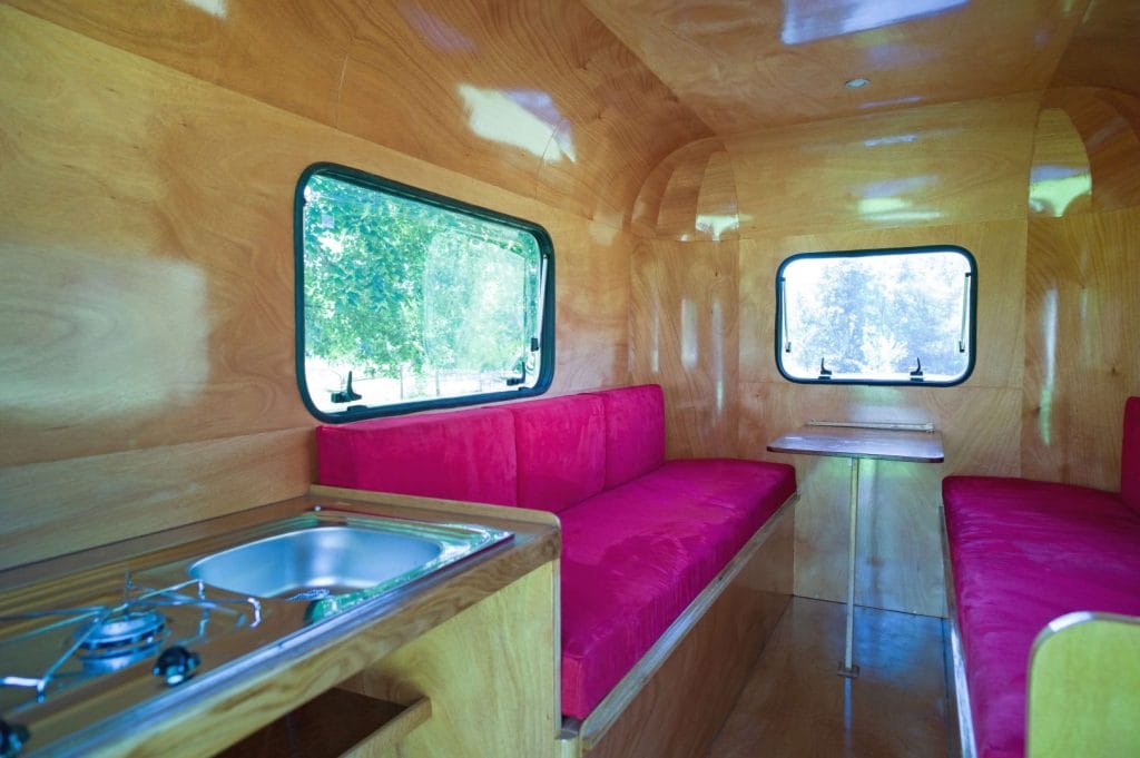 "Interior shot looking forward." From the article, "The Woodenwidget Plystream Camper" by Robin 'Benjy' Benjamin, featured in Epoxyworks 61.