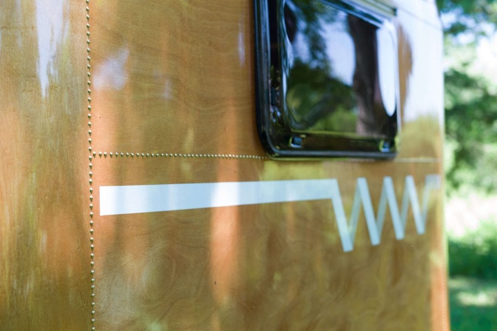 "The graphics and ‘rivets’." From the article, "The Woodenwidget Plystream Camper" by Robin 'Benjy' Benjamin, featured in Epoxyworks 61.